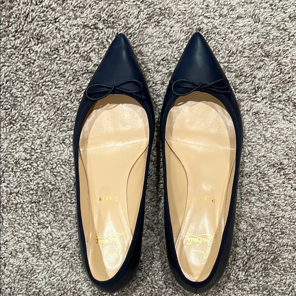 Louboutin studded flats